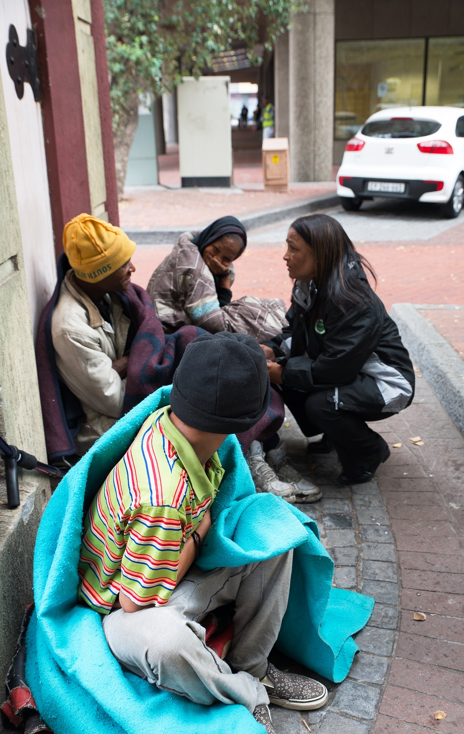 CCID Fieldworker Shanien Rich interacting with clients